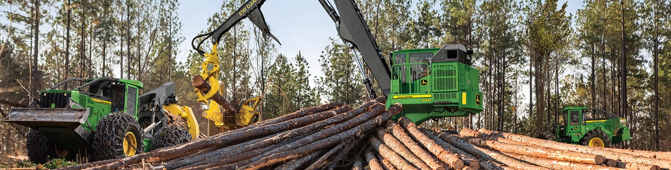 John Deere Knuckleboom Loader Moving Logs