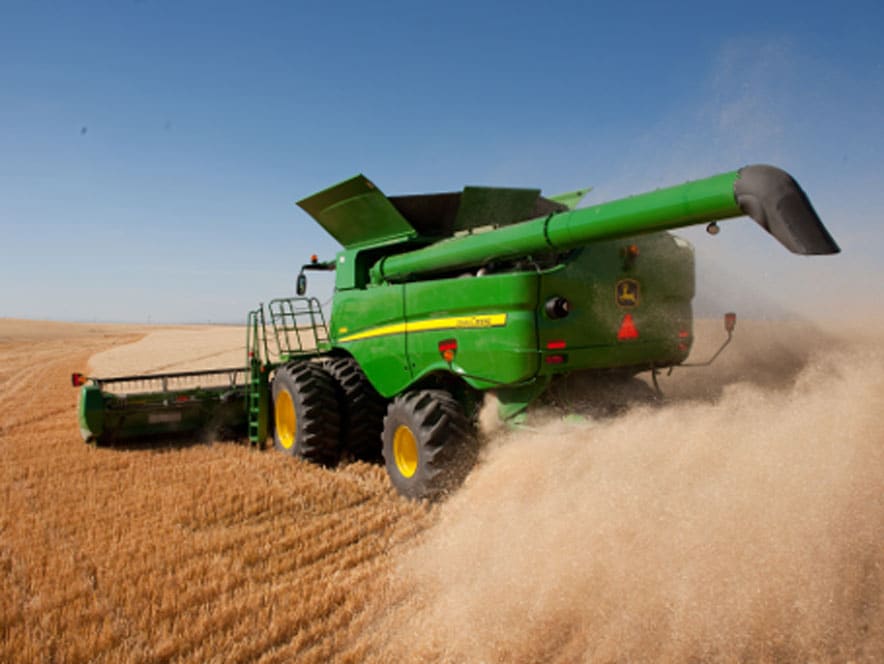 john deere tractor on field