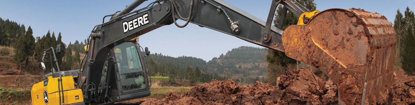 E130 II Excavator working on a jobsite.