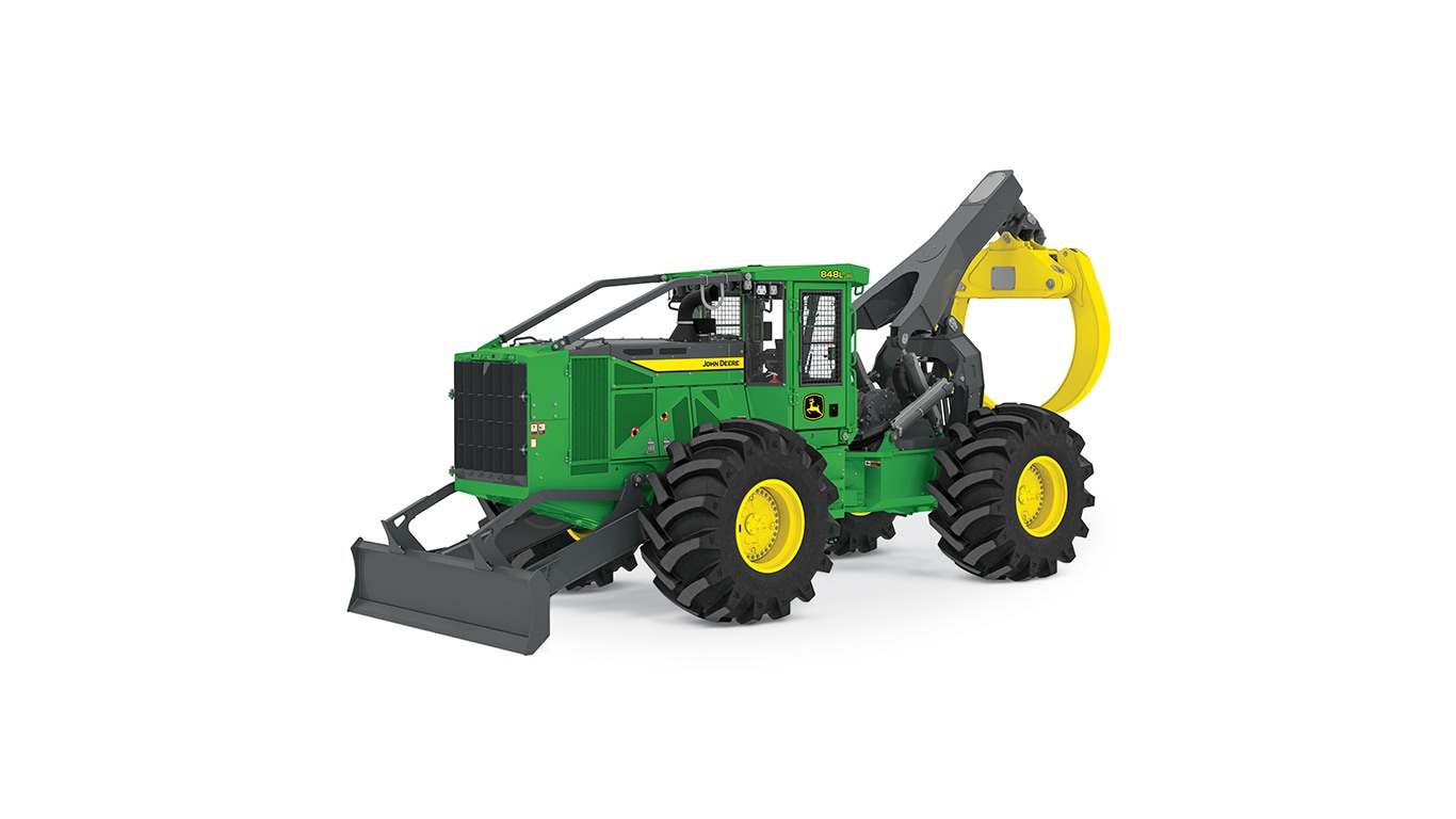 Green and yellow forestry machine with large tires and front grapple attachment.