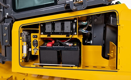 The 450 P dozer uses a simplified aftertreatment system without the need to use DEF fluid (left service compartment shown)