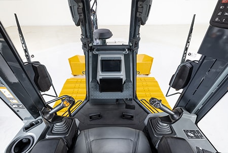 View from inside the updated cab of John Deere’s small dozer lineup