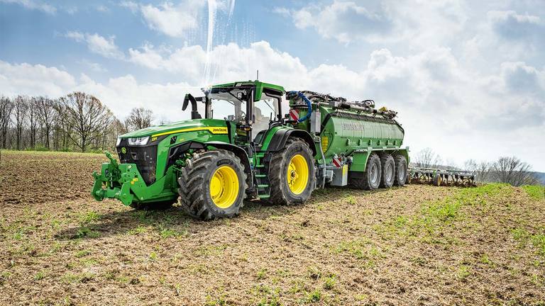 StarFire 7000 on 8R 410 Tractor With Field Implement Action Shot - Front Left View